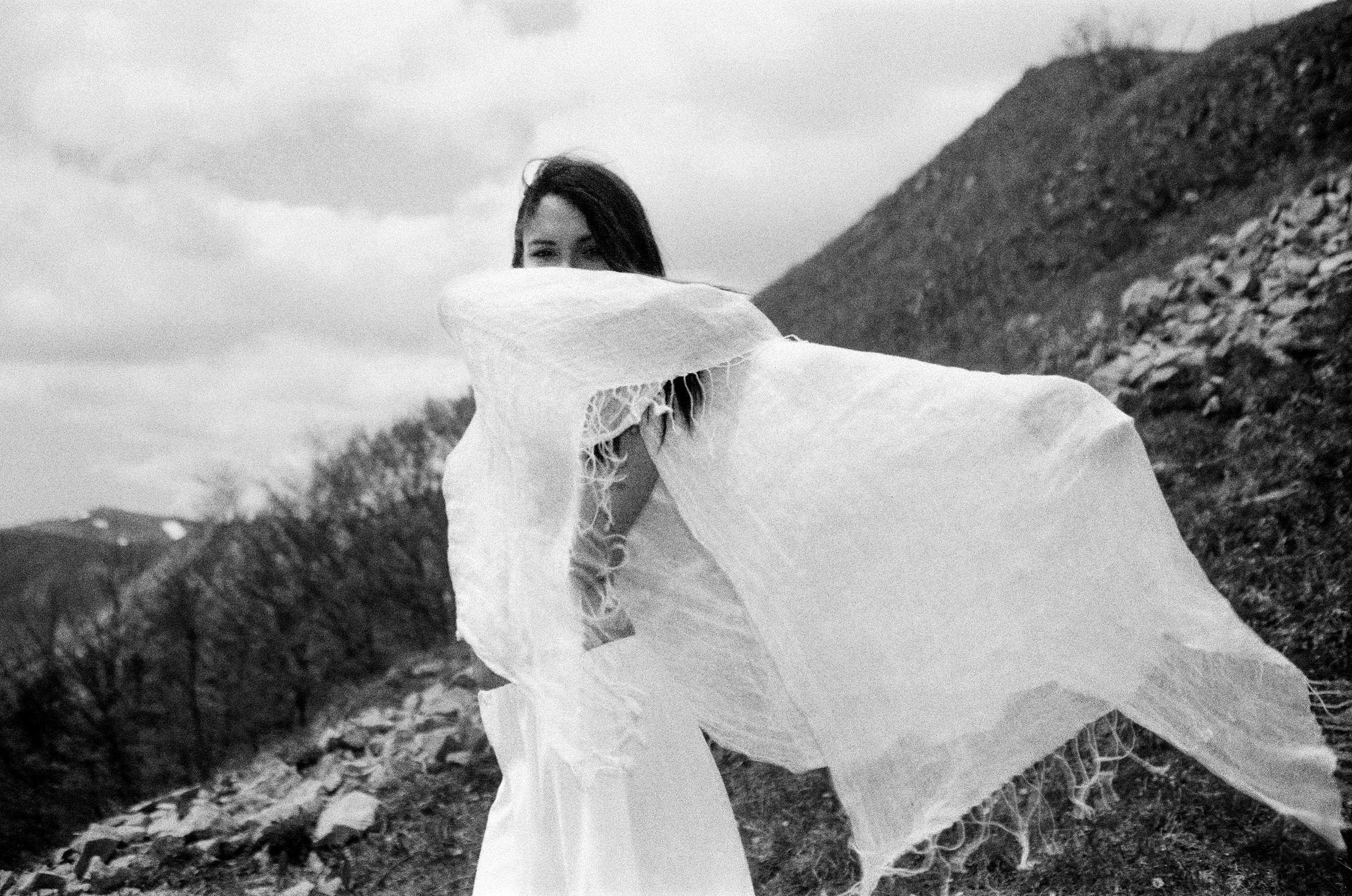 Official black and white portrait of MEA in the mountains